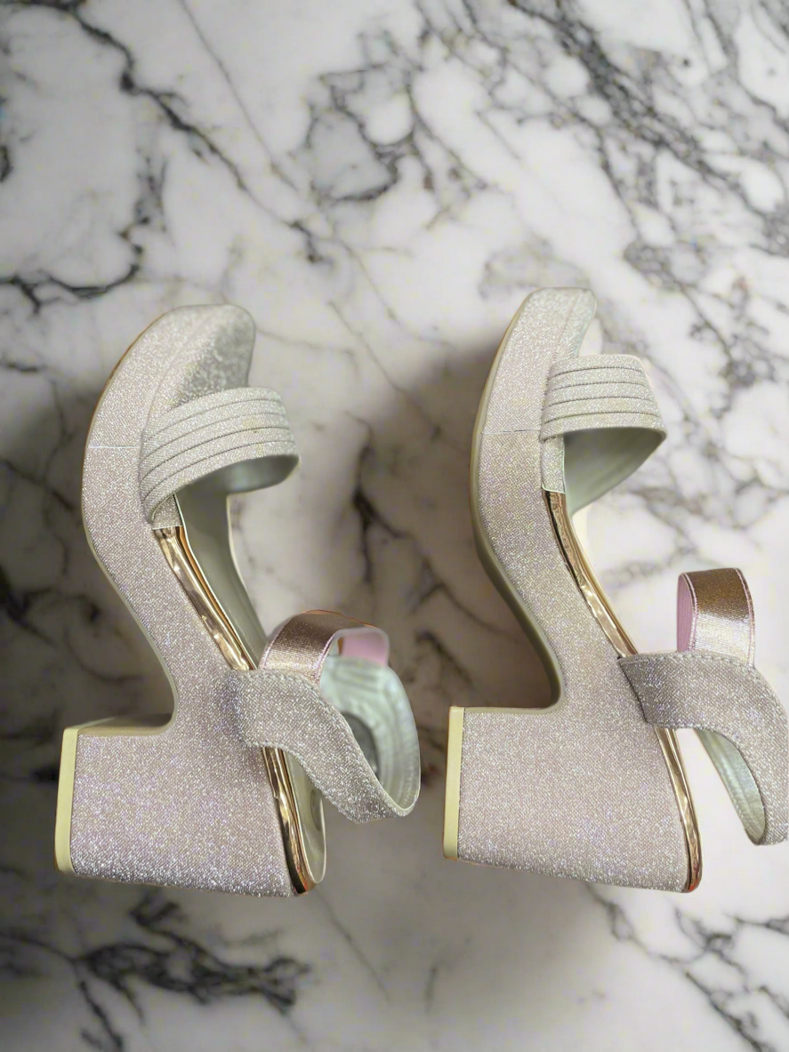 Shimmering Silver Glitter Wedge Heels with Unique Sculpted Heel