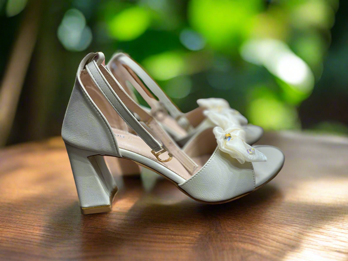 Elegant Ivory Block-Heel Sandals with Bow Detailing